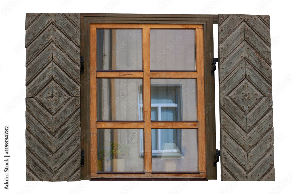 Wooden window with shutters isolated exterior side Wooden window with shutters isolated exterior side
