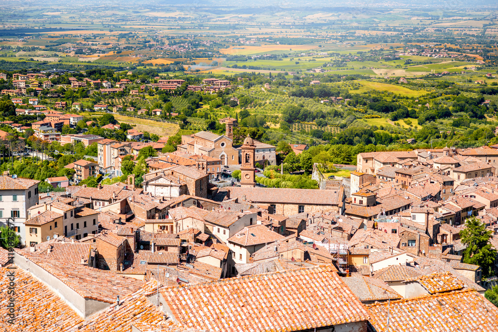 Montepulciano cityscape view on the old buildings and Saint Agostino church in Tuscany region in Italy