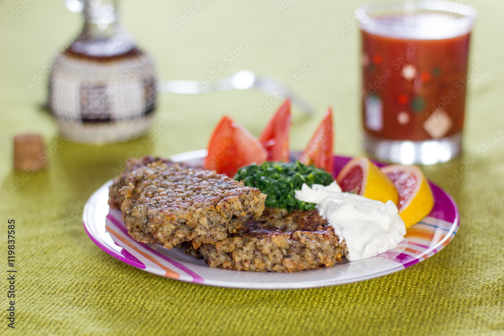 Fried vegetarian cutlet and vegetables Fried vegetarian cutlet and vegetables