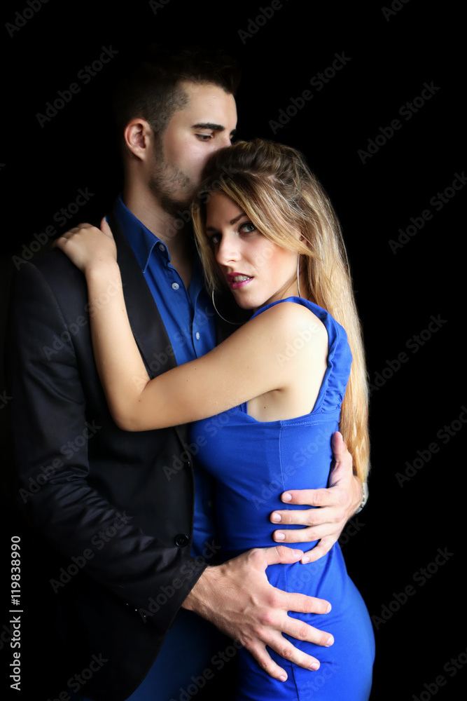 Studio photo of beautiful couple in elegant clothes. love story, Valentine's day Studio photo of beautiful couple in elegant clothes. love story, Valentine's day