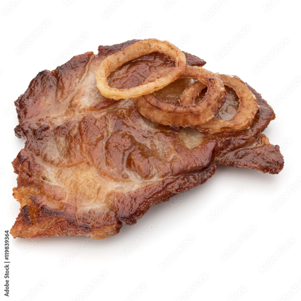 Cooked fried pork meat with onion slices garnish isolated on whi