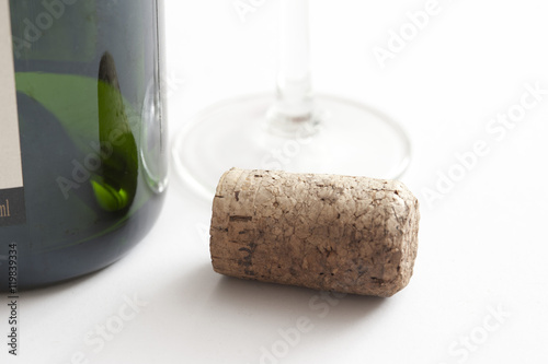 Cork with Bottle and Glass on White Background