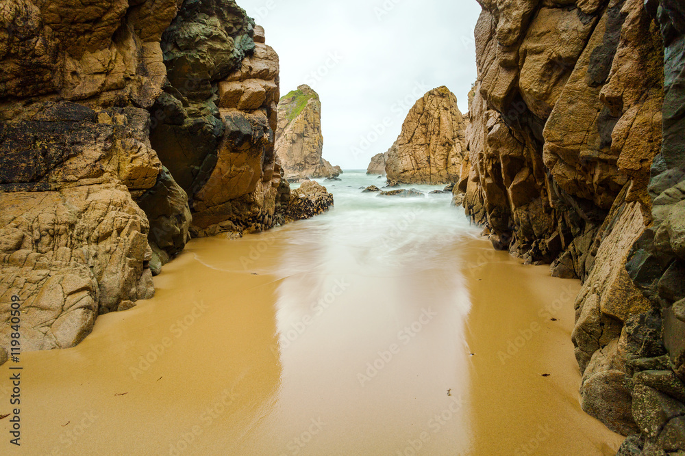 Isolated beach Ursa on Atlantic coast near the Cape Roca, Sintra, Portugal