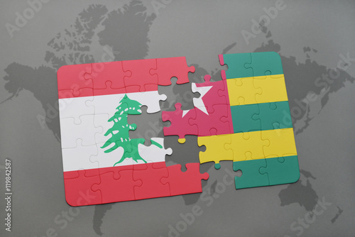 puzzle with the national flag of lebanon and togo on a world map background.