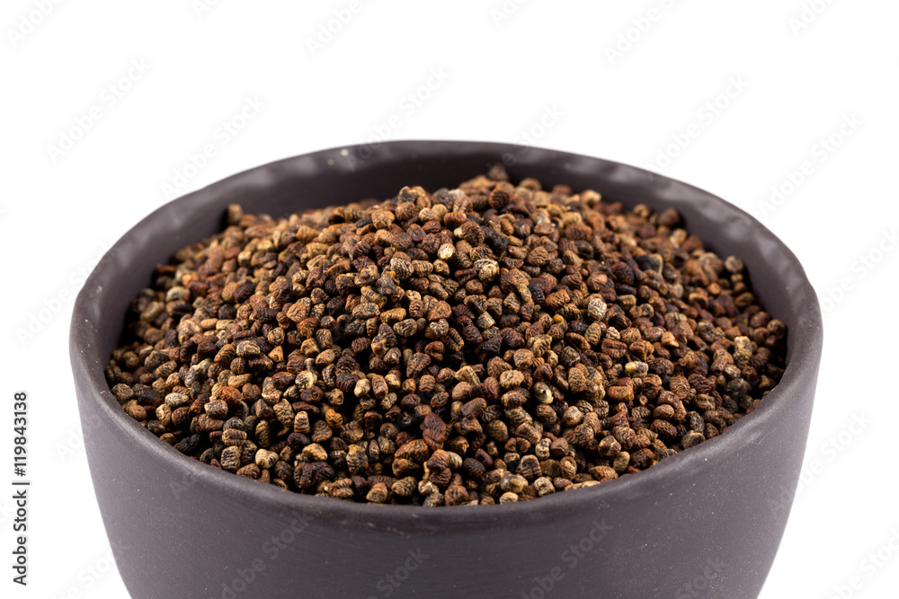 Decorticated cardamom seeds in a bowl Decorticated cardamom seeds in a bowl