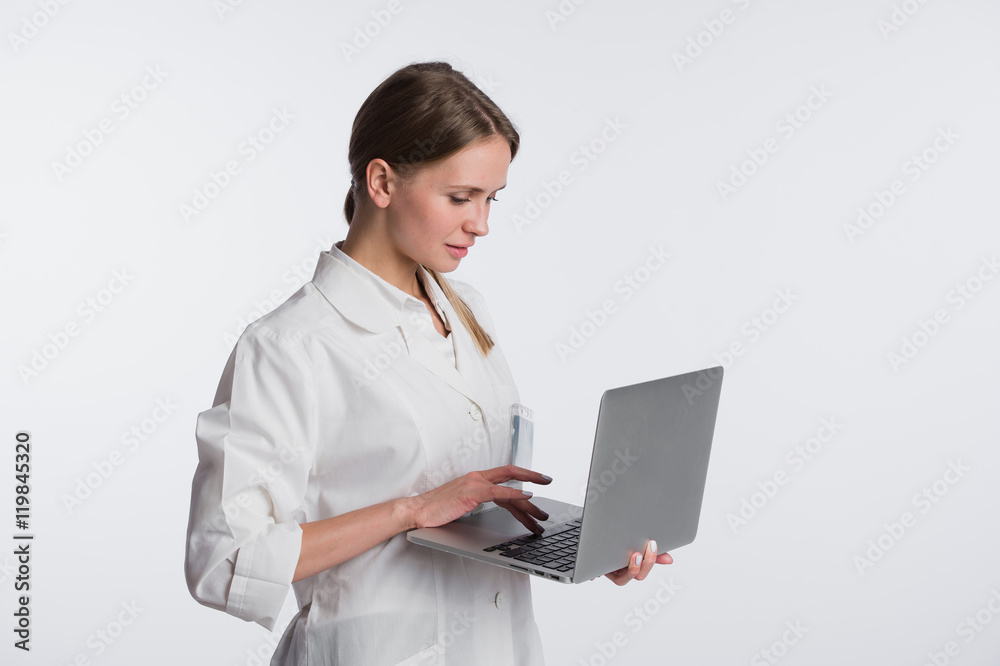 medical doctor woman smile hold tablet pc, using computer. nurse with stethoscope Isolated over white background medical doctor woman smile hold tablet pc, using computer. nurse with stethoscope Isolated over white background