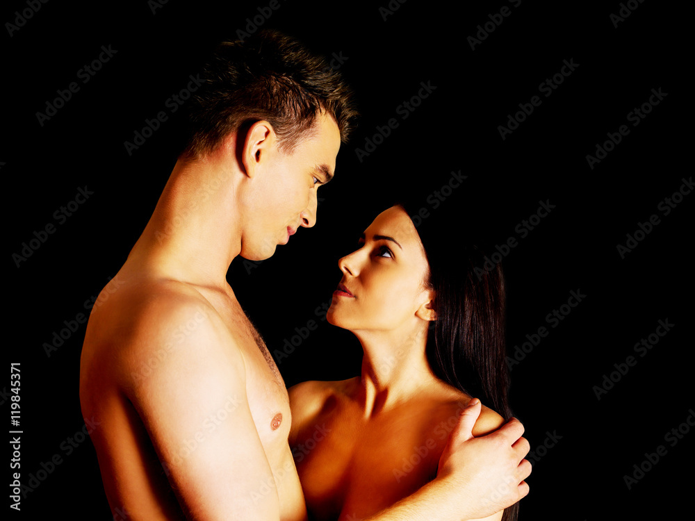 Beautiful nude couple in a tender embrace. Beautiful nude couple in a tender embrace.