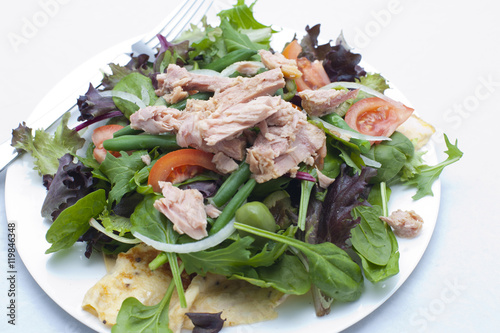 Healthy nicoise salad topped with tuna