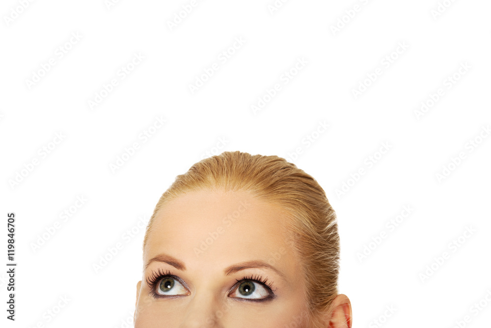 Beautiful female eyes looking up for copyspace or something Beautiful female eyes looking up for copyspace or something