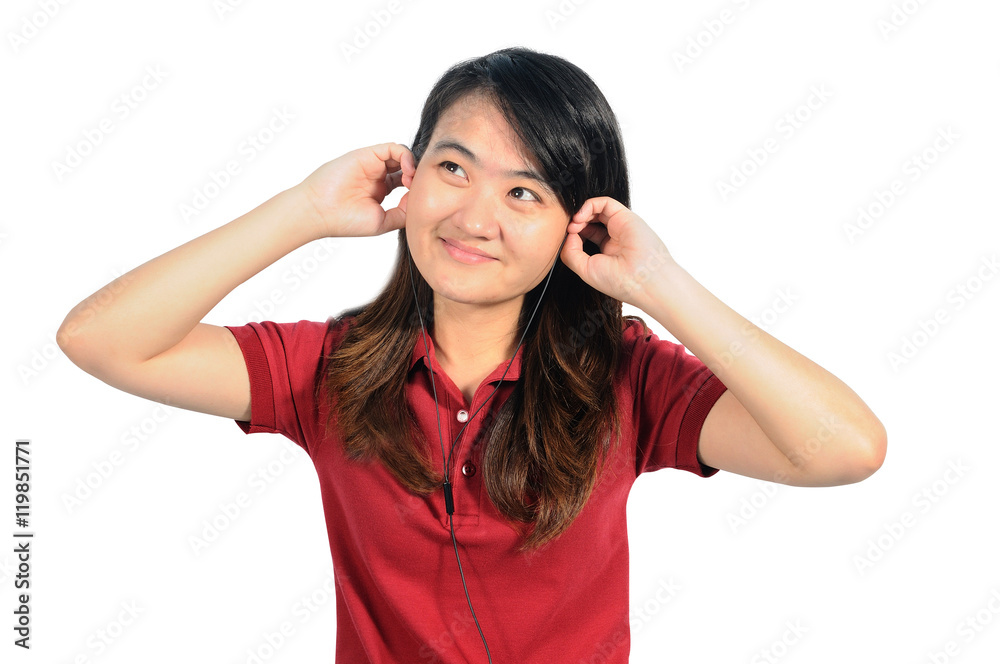 Asian middle woman enjoy with music by earphone of her mobile ph Asian middle woman enjoy with music by earphone of her mobile ph