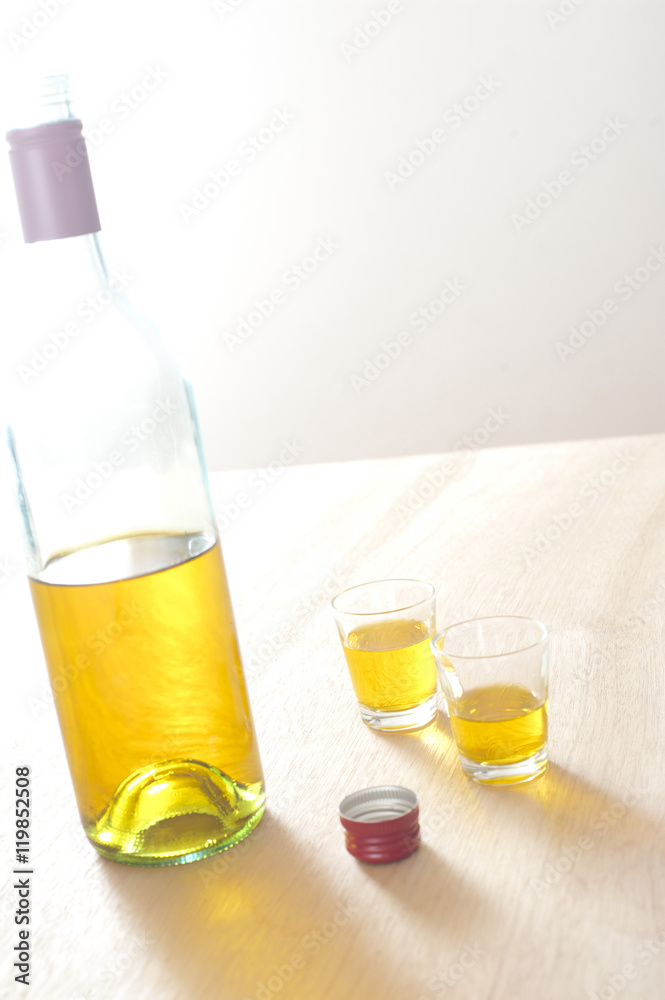 Bottle of sprits with two shots Bottle of sprits with two shots
