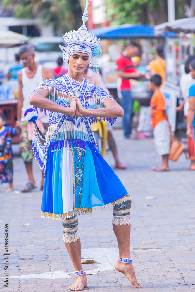 Naklejka premium Nora is a form of traditional, folk performing arts that is popular in the southern region of Thailand. The main elements and characteristics of Nora are the costume and the music.