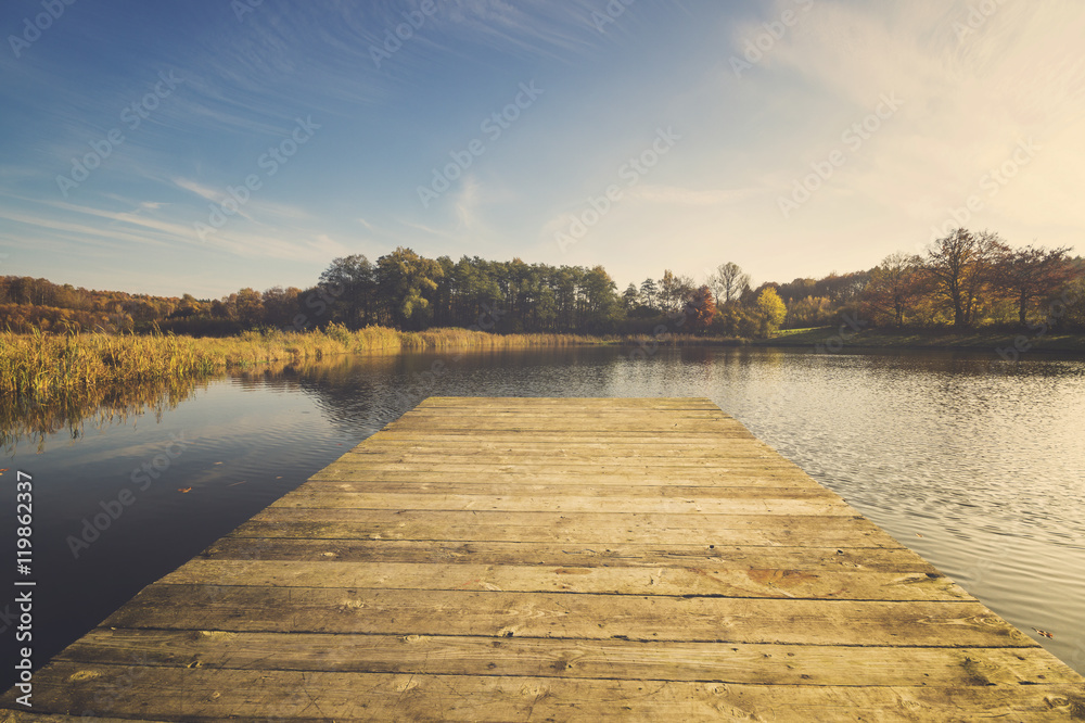 Fototapeta premium Lake in autumn, colorful robes, yellowed, colorful leaves on tre