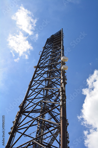 Mobile phone tower. Mobile phone network. Cell site or cell tower, cellular telephone site, electronic communications equipment, radio mast, cellular network digital signal processors.