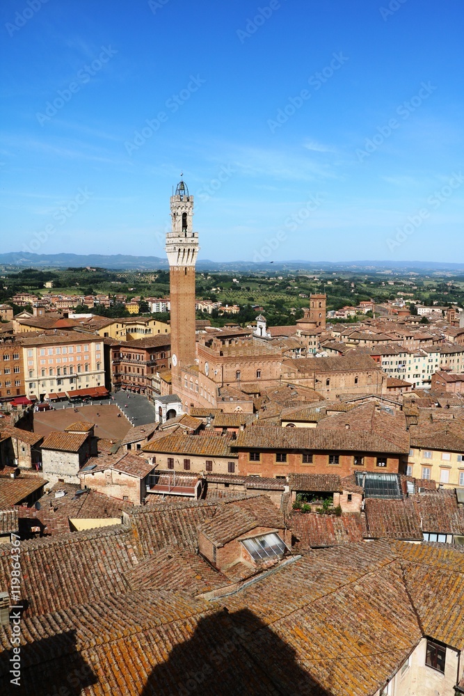 View to Piazza del Campo and Torre del Mangia in Siena, Tuscany Italy