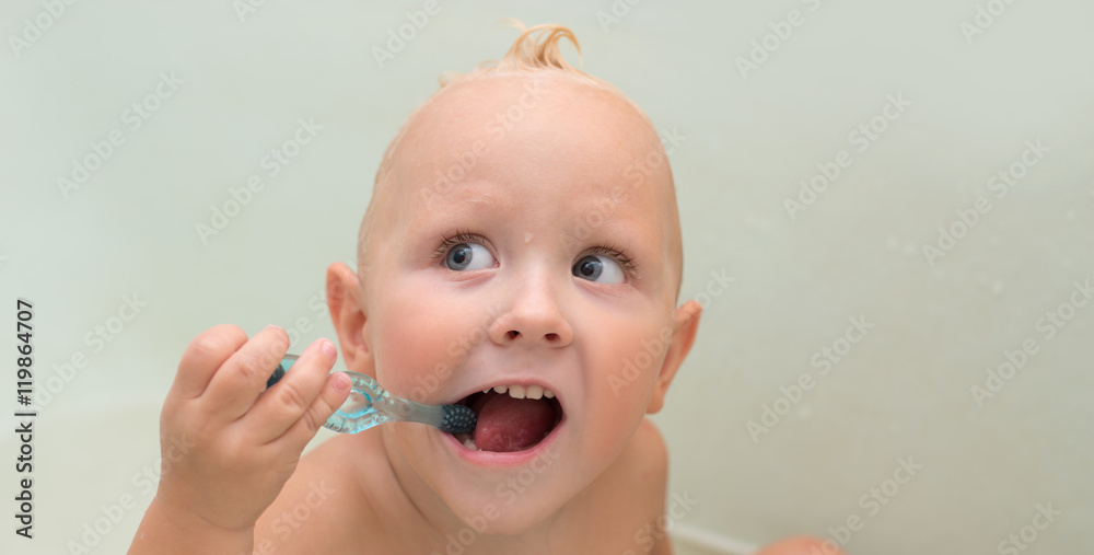 Portrait of cute baby in the bathtub while bathing Portrait of cute baby in the bathtub while bathing