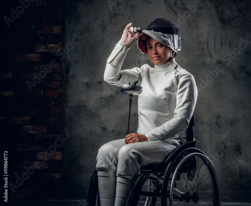 Fotografija Female paralympic wheelchair fencer.