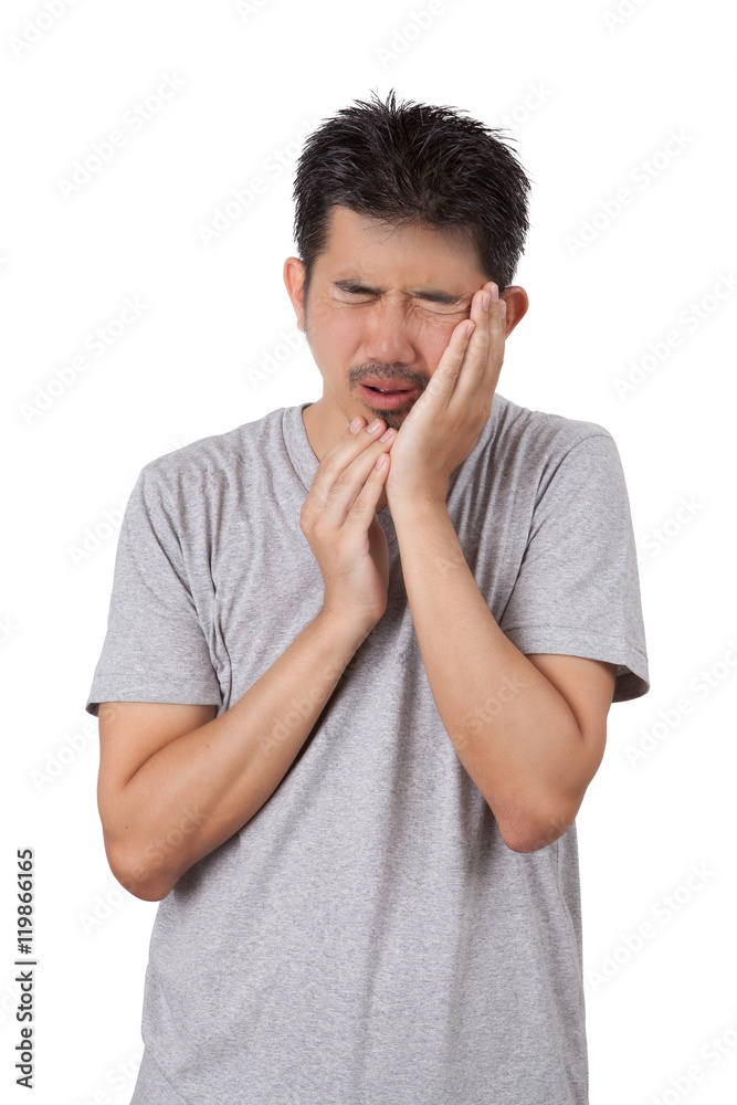 The sick man standing on white background and put his hands on h The sick man standing on white background and put his hands on h
