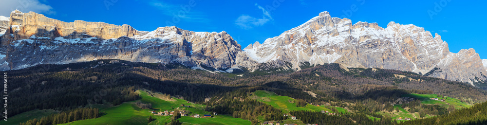 Alpine valley in the spring sunshine. Panorama
