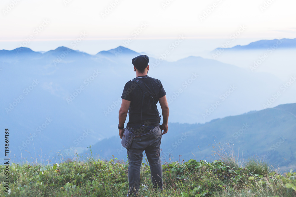 landscape view of great mountains and man silhouette, watching panorama, wild, pro nature concept