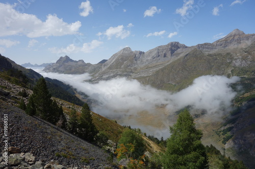 valley with an emerging sea of clouds in the french Pyrenees