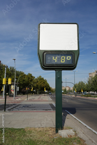 high temperature on the street. A thermometer with no advertisement showing 48 degrees