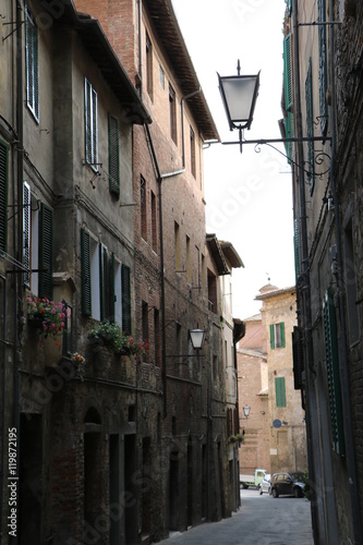 Typical narrow alley in Siena, Tuscany Italy 