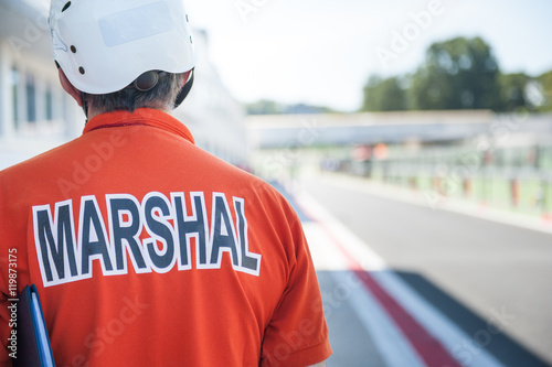 Fotografie Motorsport track marshall racing bib close up