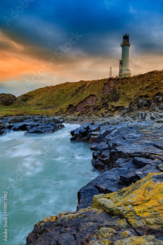 Girdle Ness lighthouse During Sunrise in Aberdeen, Scotland UK