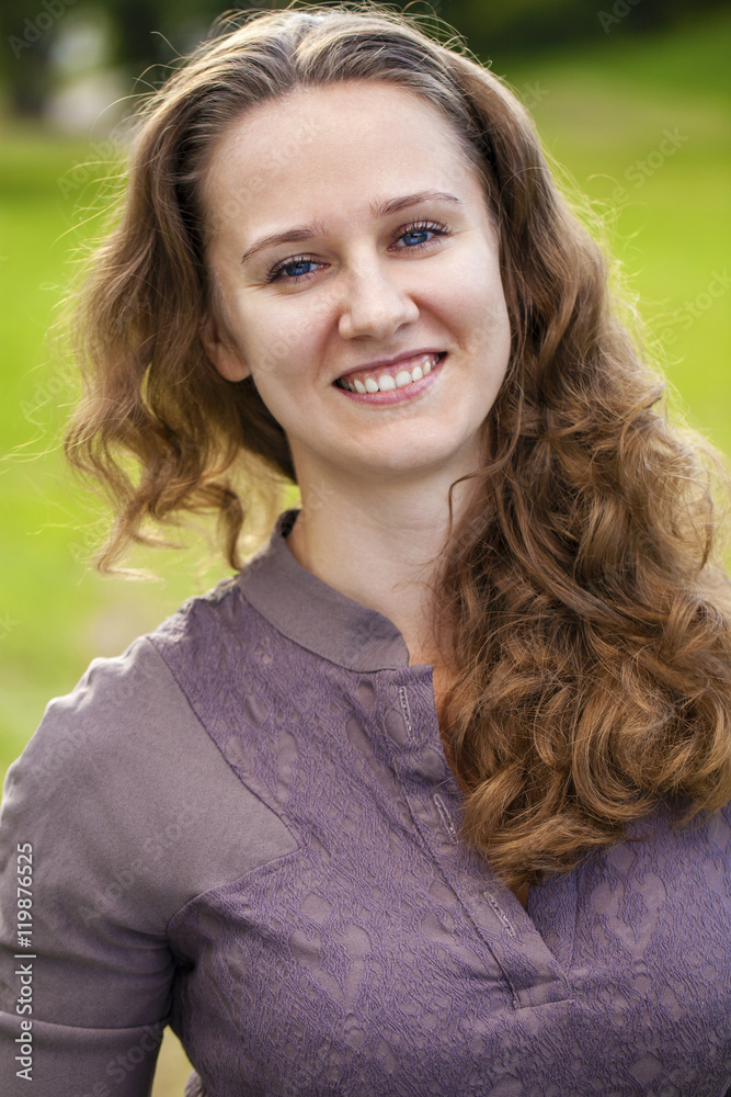 Fototapeta premium Portrait of beautiful young happy woman