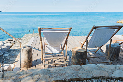 Wooden floor with chaise-longues in Istria