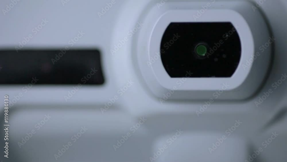 Modern automated machine examining eyeball. Eye examination test on a professional medical equipment screen. HD. Modern automated machine examining eyeball. Eye examination test on a professional medical equipment screen. HD.
