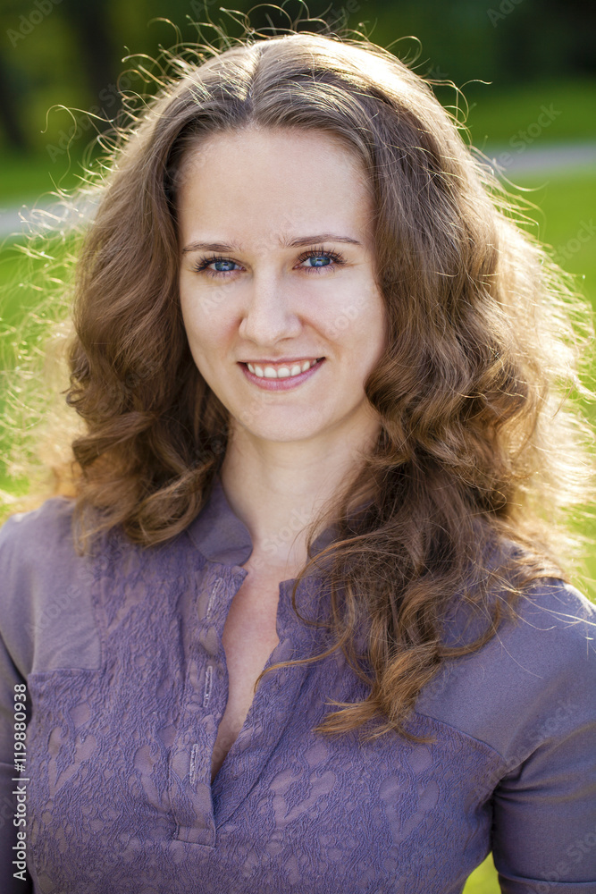 Fototapeta premium Portrait of beautiful young happy woman