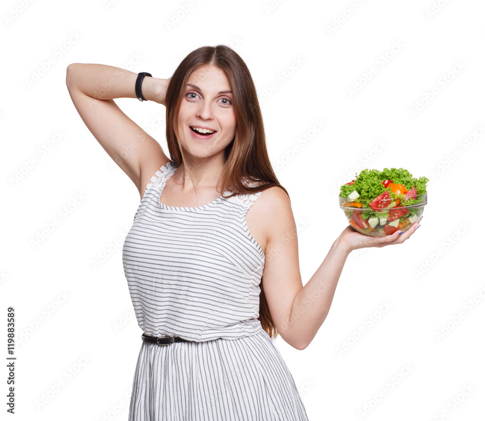 Happy woman shows fresh vegetable salad isolated on white Happy woman shows fresh vegetable salad isolated on white