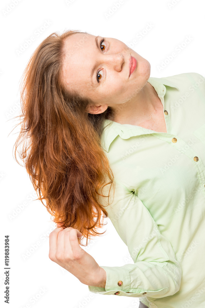 red-haired girl touching her hair, a portrait on a white backgro red-haired girl touching her hair, a portrait on a white backgro