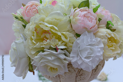 Beautiful white roses in a vase close-up. Wedding decorations