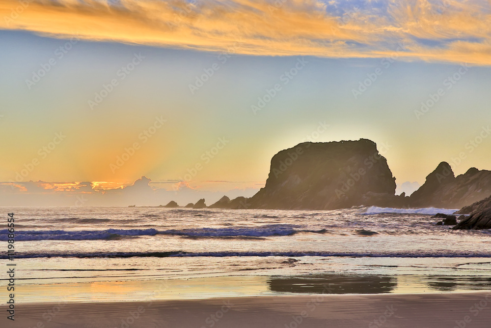 Obraz premium Eroded Cliffs on sunset background . Westport, New Zealand
