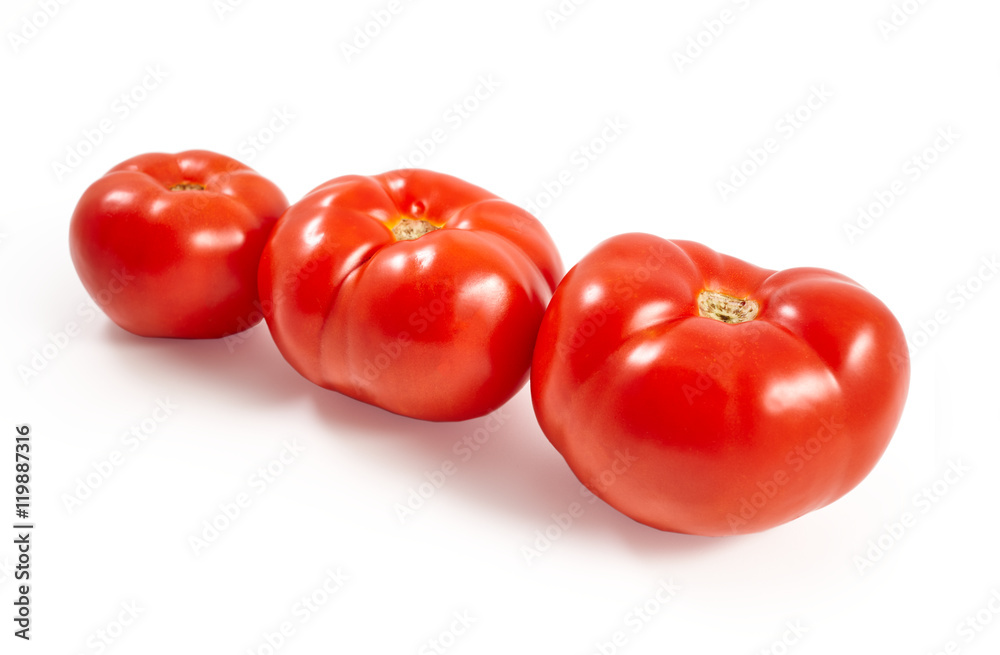A tomato. Red tomato on a white background. Harvest vegetables. Autumn harvest. Red, juicy, ripe tomato. A tomato. Red tomato on a white background. Harvest vegetables. Autumn harvest. Red, juicy, ripe tomato.