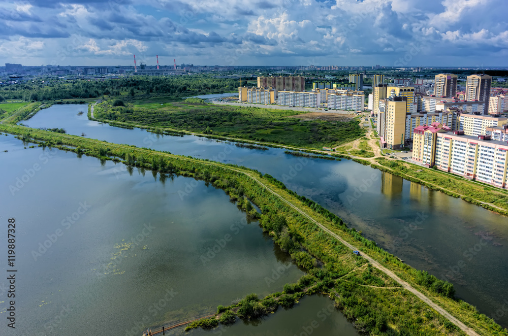 Tyumen, Russia - July 29, 2015: Aerial view on Rowing channel, lake Quitrent and Tura neighborhood