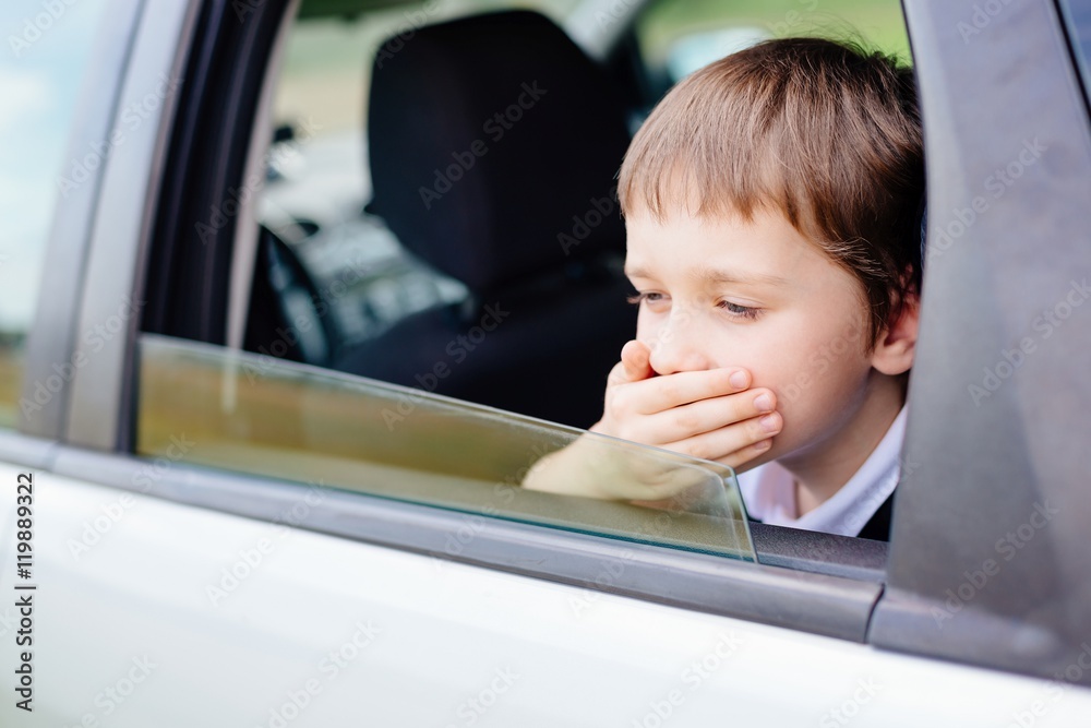 Child suffers from motion sickness in car