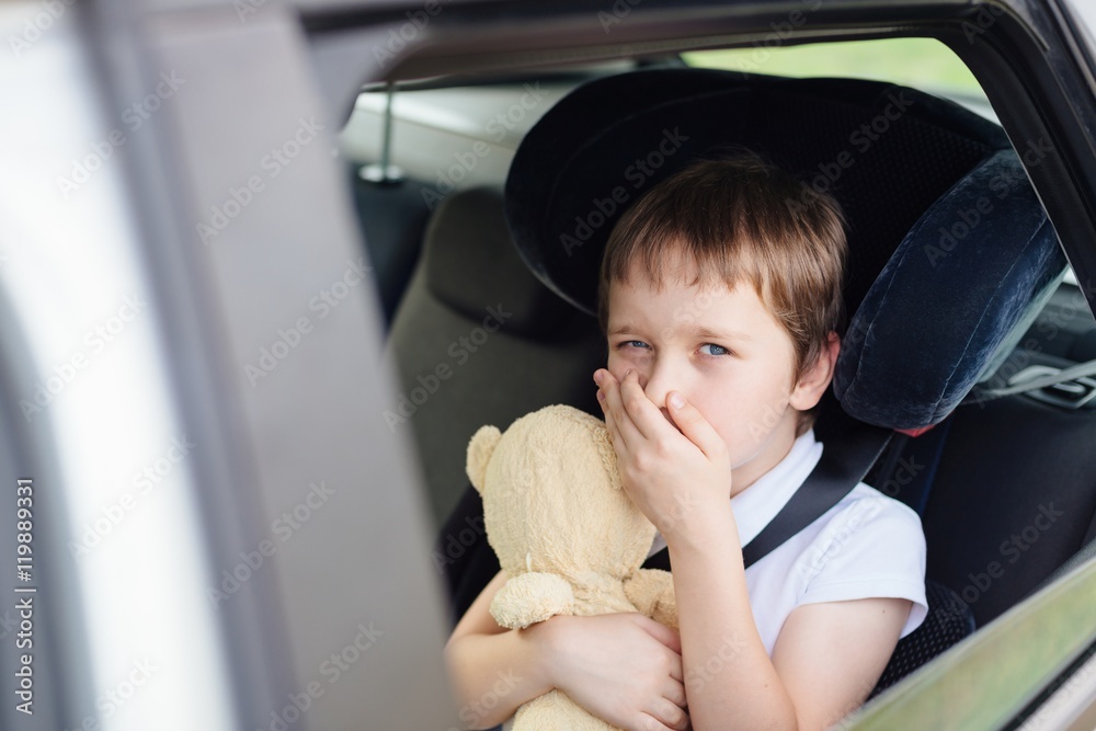 Child suffers from motion sickness in car