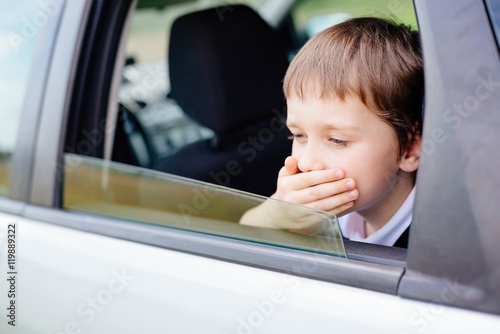 Obraz na płótnie Child suffers from motion sickness in car w salonie