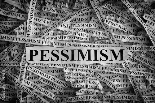 Fotografi Torn pieces of paper with the word Pessimism