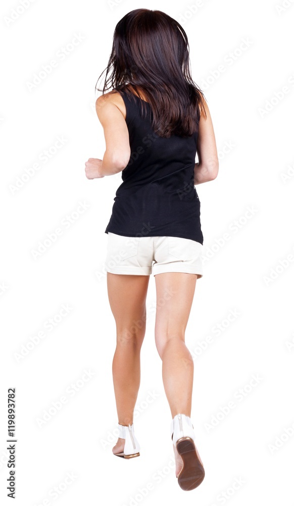 back view of running woman. beautiful brunette girl in motion. backside view of person. Rear view people collection. Isolated over white background. back view of running woman. beautiful brunette girl in motion. backside view of person. Rear view people collection. Isolated over white background.
