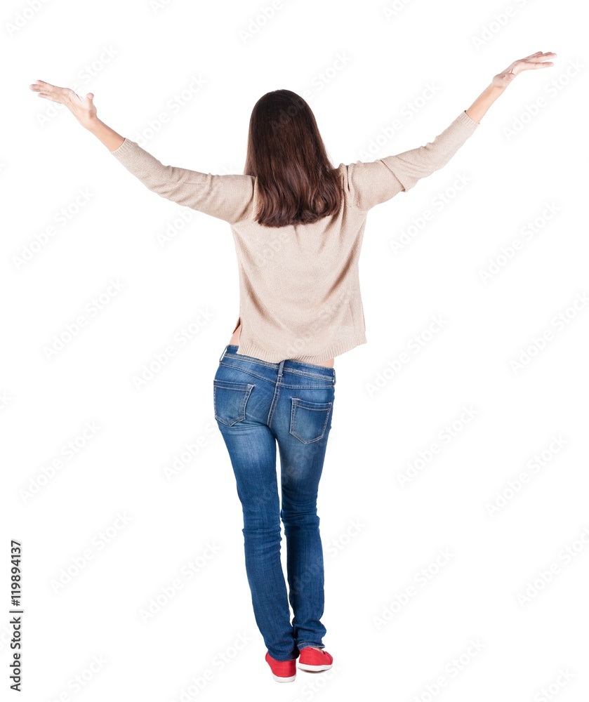back view of dancing young beautiful brunette woman. girl watching. Rear view people collection. backside view of person. Isolated over white background. back view of dancing young beautiful brunette woman. girl watching. Rear view people collection. backside view of person. Isolated over white background.