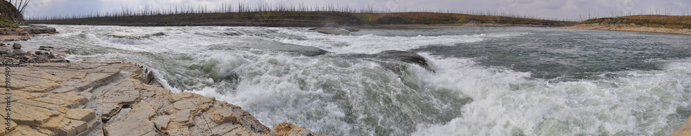 Rocky rapids on a Northern river. Rocky rapids on a Northern river.