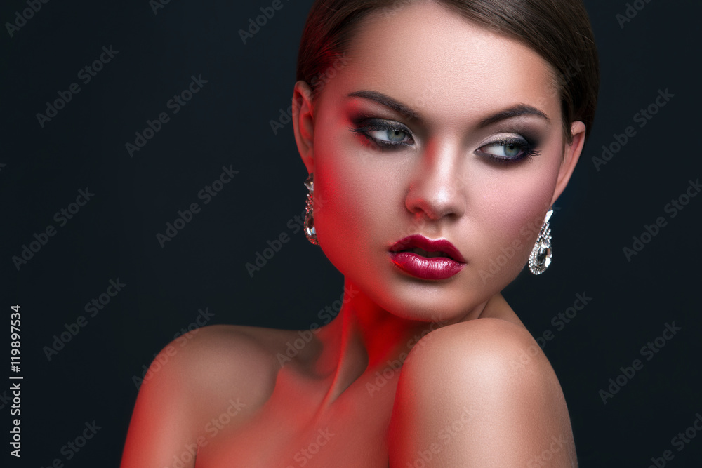 Portrait of woman with beautiful earrings Portrait of woman with beautiful earrings