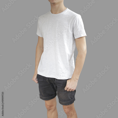 White t shirt and black shorts on a young man template on grey b