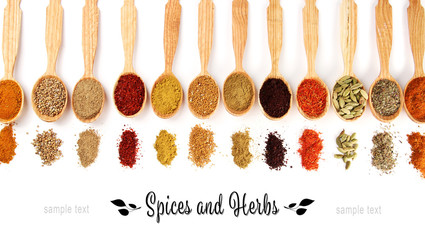 Fototapete Gewürze Different spices in wooden spoons, isolated on white  © Africa Studio