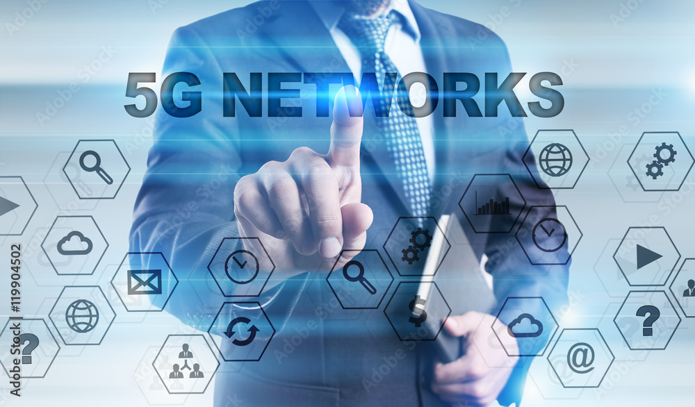 Fototapeta premium Businessman is pressing button on touch screen interface and selecting